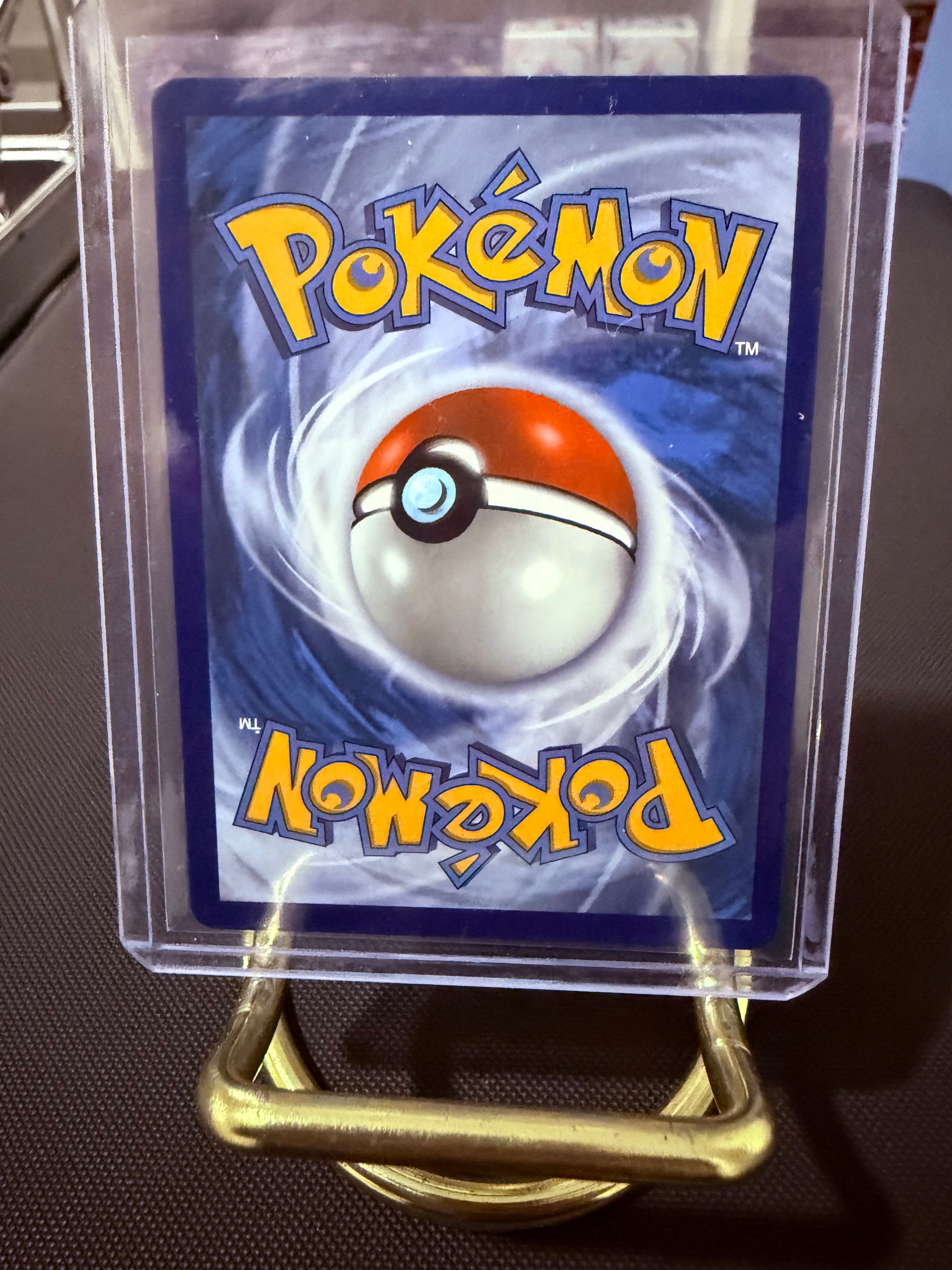 Team Rocket’s Moltres Ex Special Illustration Rare (Stamp)